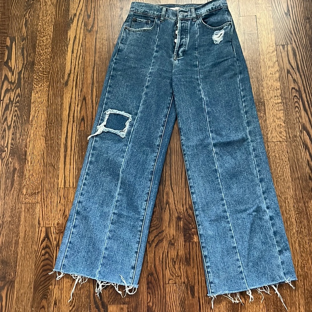 medium blue wash, with lining and rips- baggy jeans style- high rise- size 26